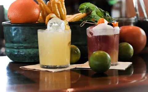 Cocktails with fruit around them